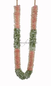 pink rose petals and baby's breath garland