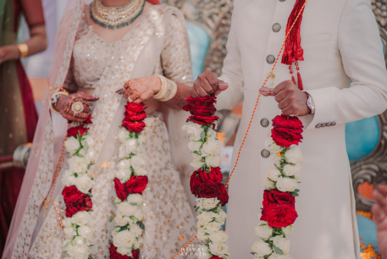 red and white rose garland